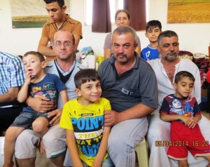 Refugees from Mosul living in a hallway in the village of Howrysk.