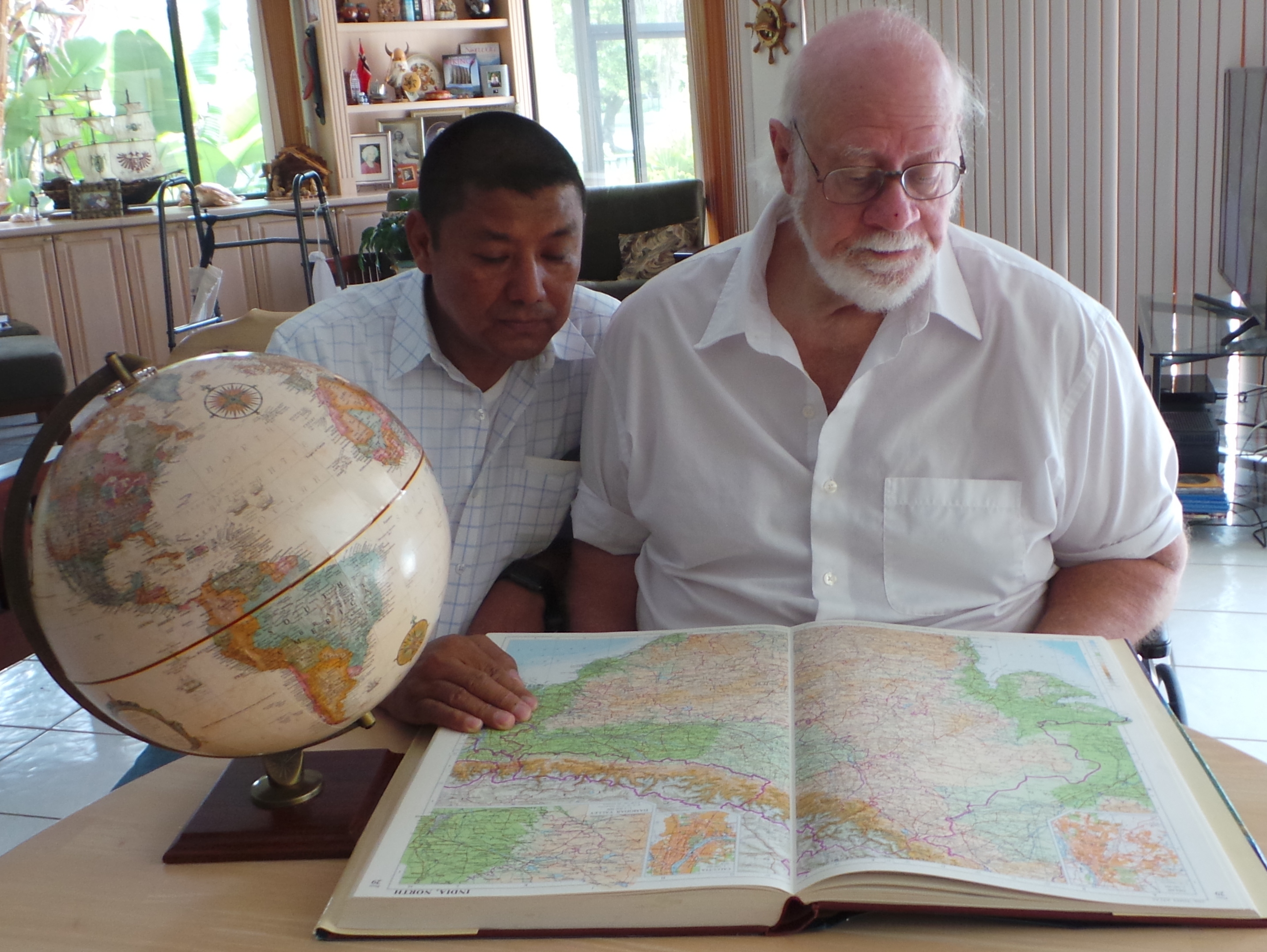 Steve with mission partner and map