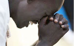 South Sudan - Man praying